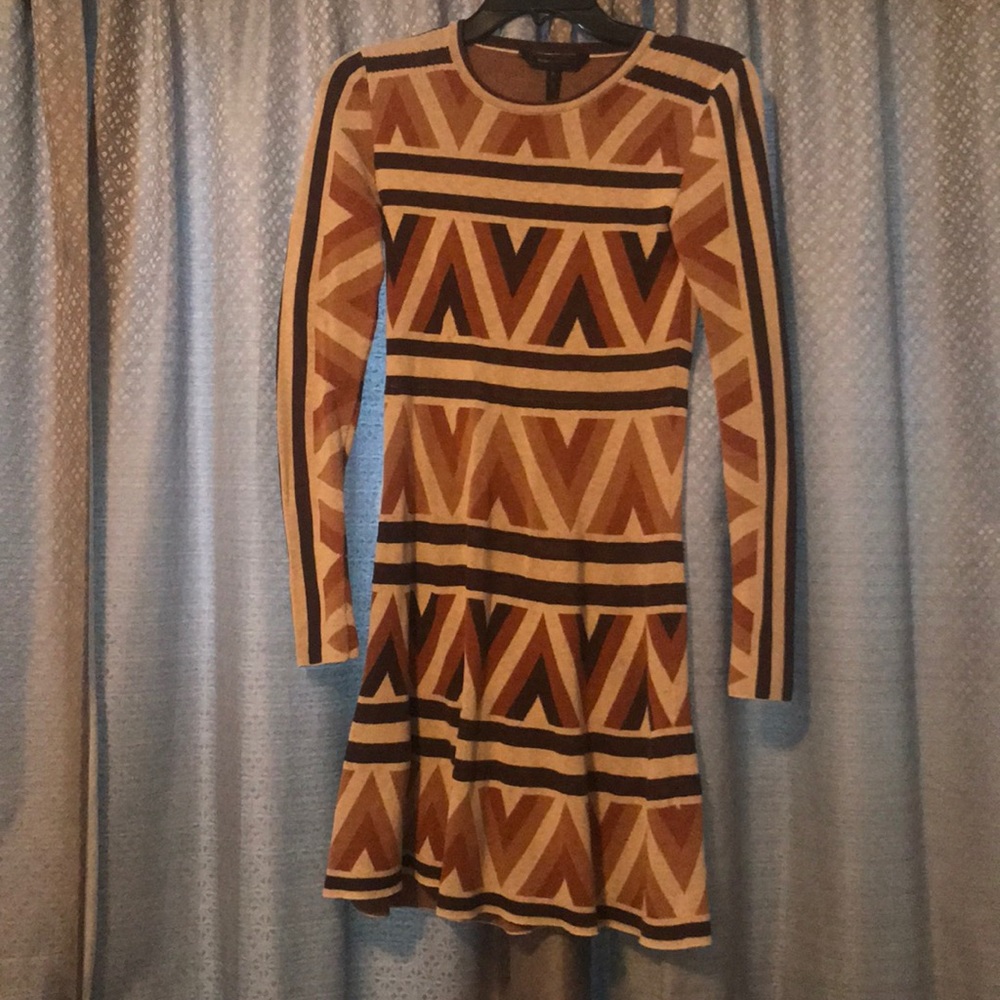 Geometric design, fitted BCBGMAXAZRIA dress.